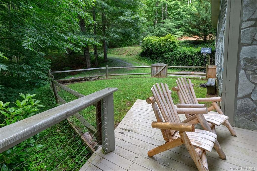 136 Dars Lane Tuckasegee, NC 28783 - Photo 35 of 48 a balcony with chairs