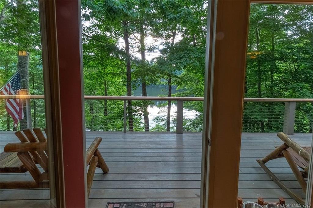 136 Dars Lane Tuckasegee, NC 28783 - Photo 8 of 48 a view of a balcony with wooden floor