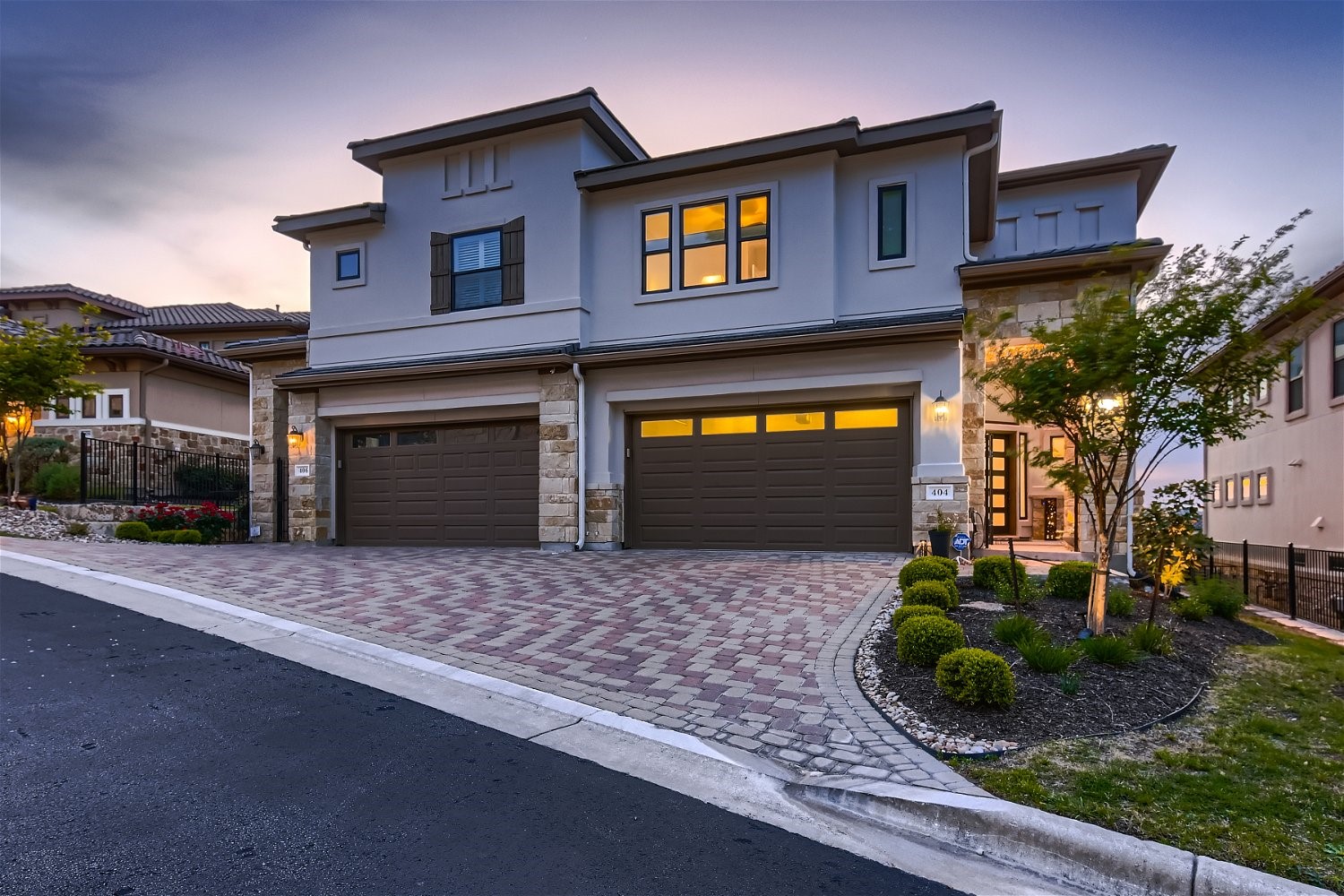 404 Marina View Way Lakeway, TX 78734 - Photo 15 of 23 a front view of a house with garden