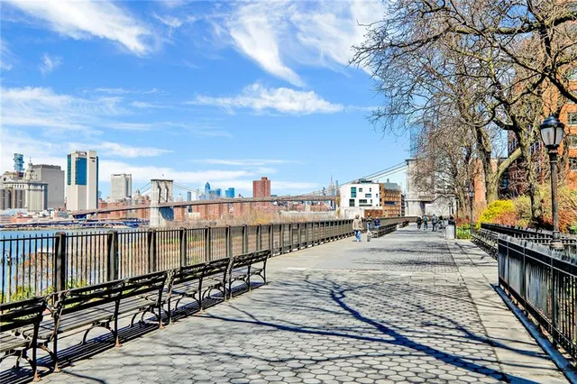 a view of a terrace with wooden benches
