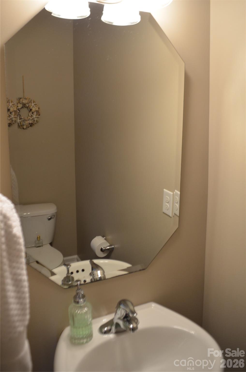 4549 Tradd Circle Monroe, NC 28110 - Photo 18 of 33 a bathroom with a sink and a toilet