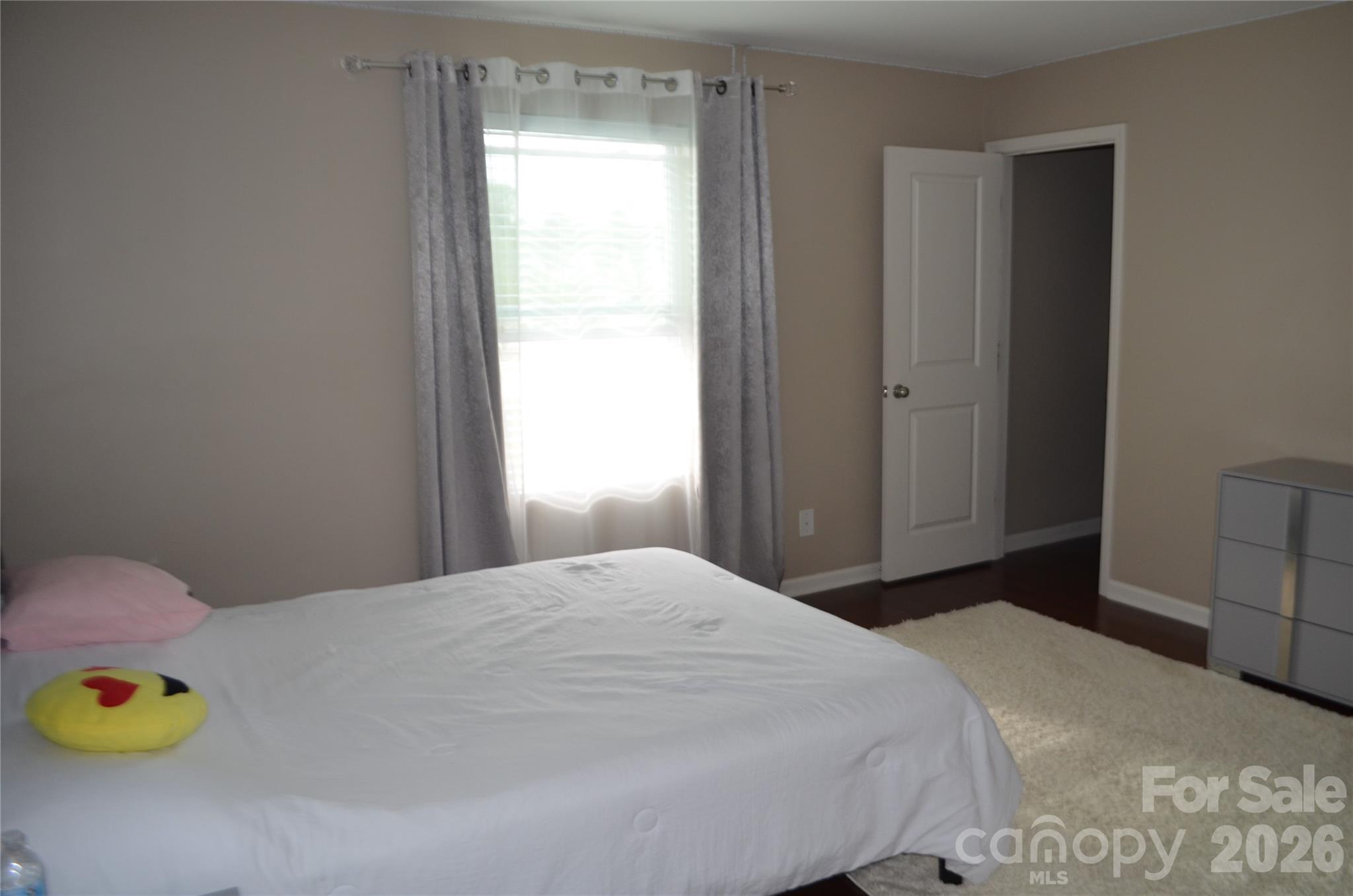 4549 Tradd Circle Monroe, NC 28110 - Photo 25 of 33 a bedroom with a bed and a window