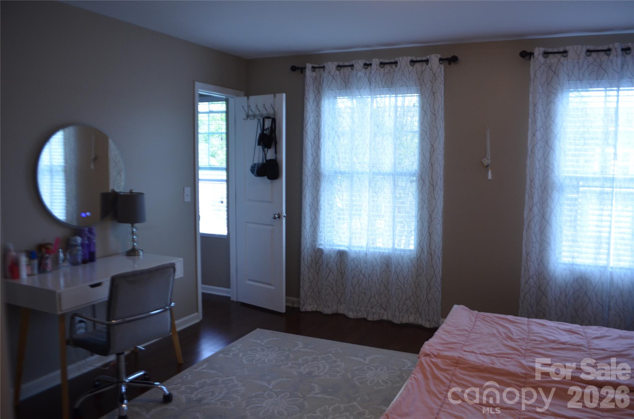 4549 Tradd Circle Monroe, NC 28110 - Photo 26 of 33 a bedroom with a bed and a mirror