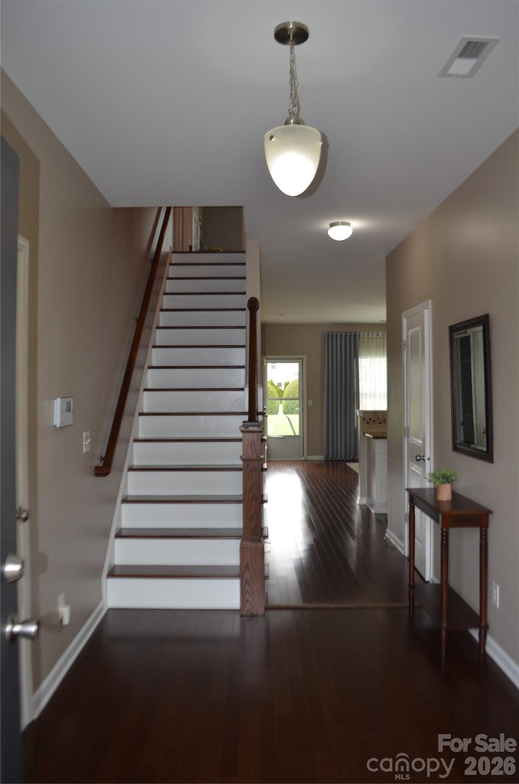 4549 Tradd Circle Monroe, NC 28110 - Photo 4 of 33 a view of entryway and hall with wooden floor