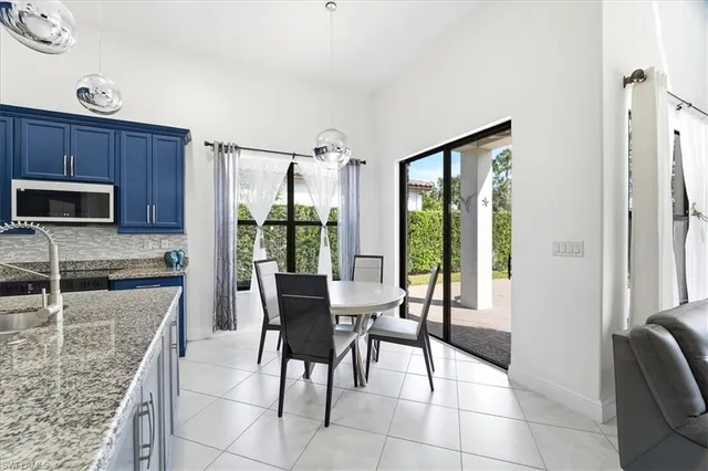 a view of a dining room kitchen and furniture