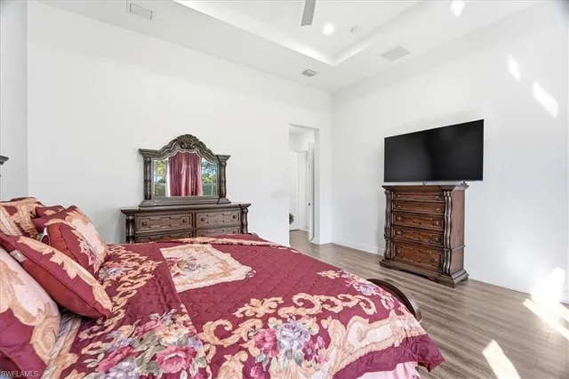 a bathroom with a double vanity sink mirror and shower