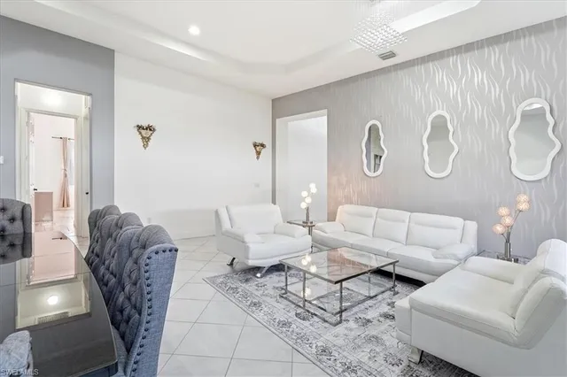 a living room with furniture and a table