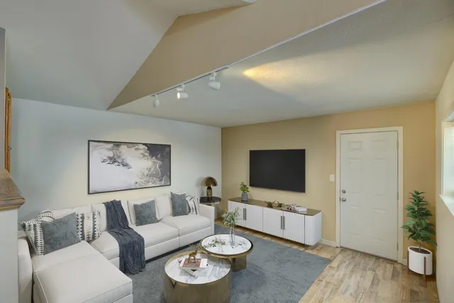 a dining room with furniture and window