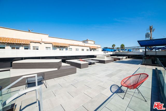 a balcony with an outdoor space