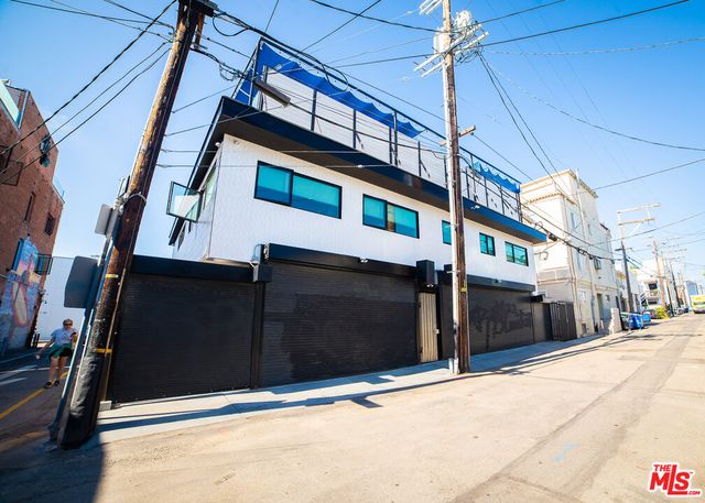 a view of a building with a street