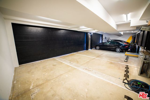 a view of garage with gym equipment