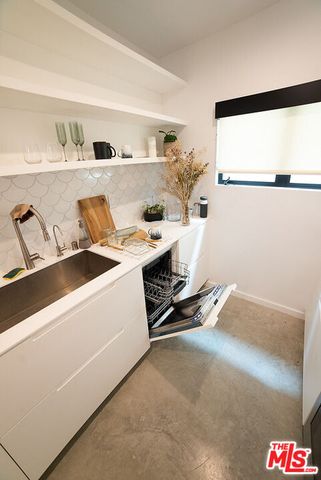 a room with storage and utility