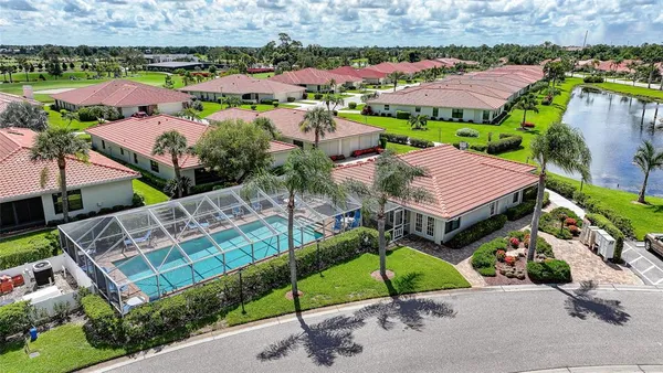 an aerial view of a house with a garden
