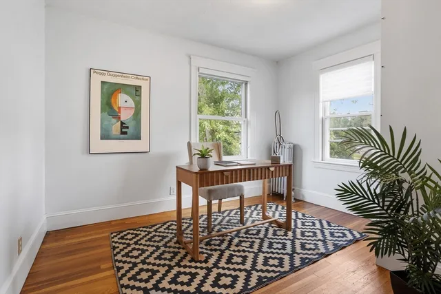 a bed room with furniture and a window