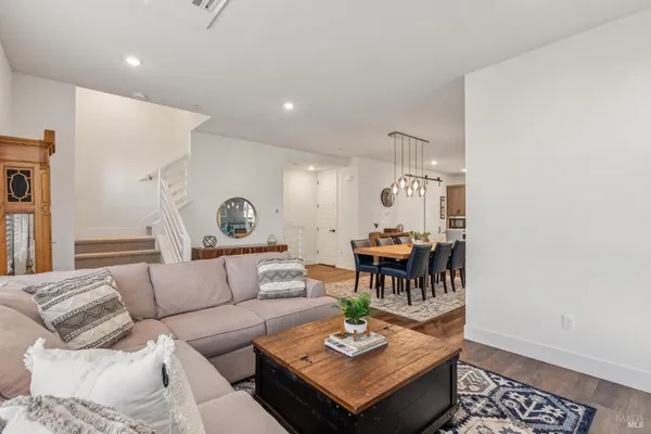 a living room with furniture and a table