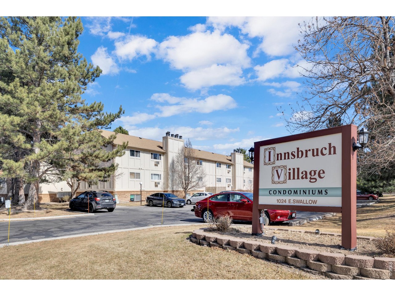 1024 East Swallow Road, Unit 234 Fort Collins, CO 80525 - Photo 19 of 21 a sign on the side of a road