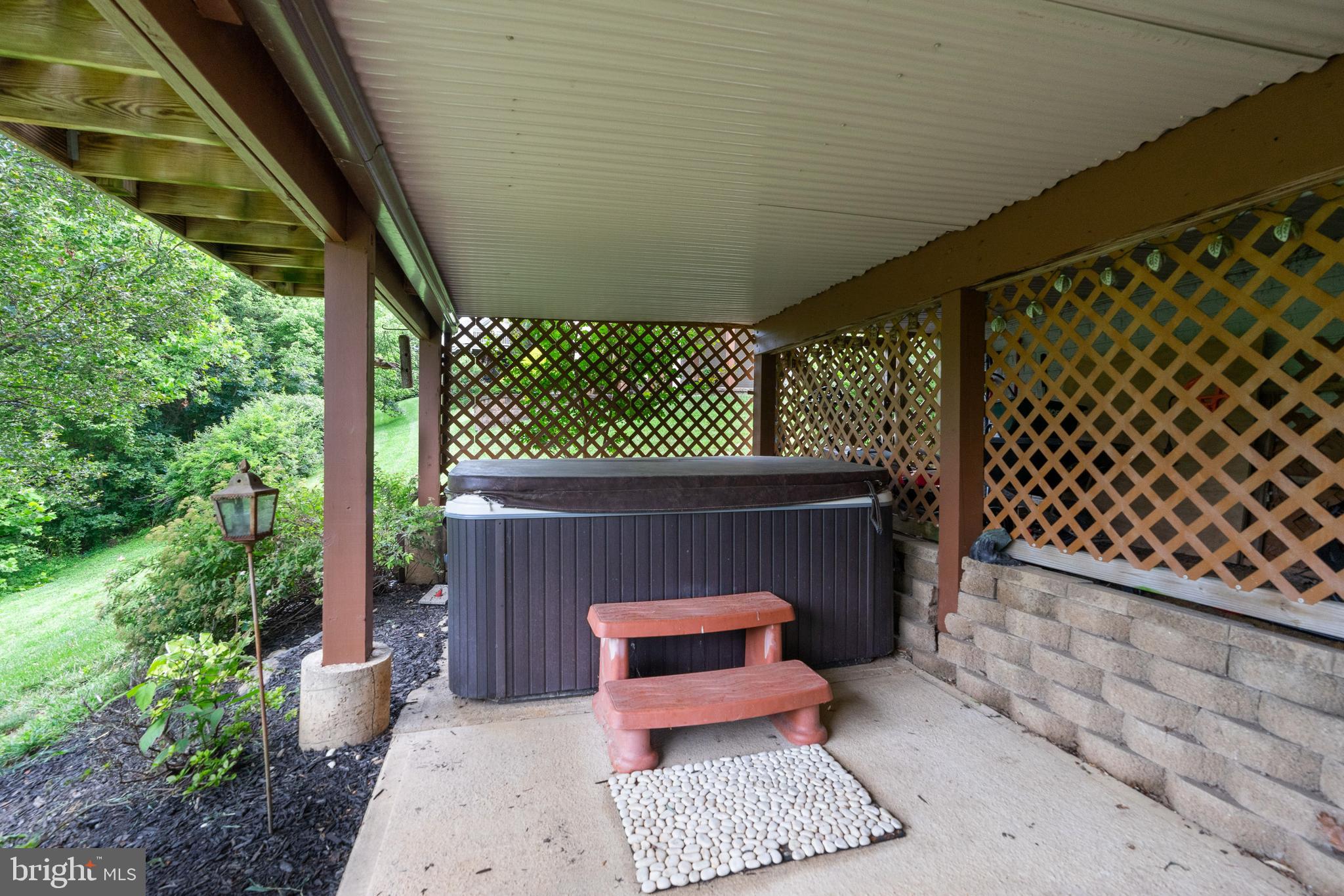 11030 Country Club Road New Market, MD 21774 - Photo 53 of 63 Hot tub area with under deck system