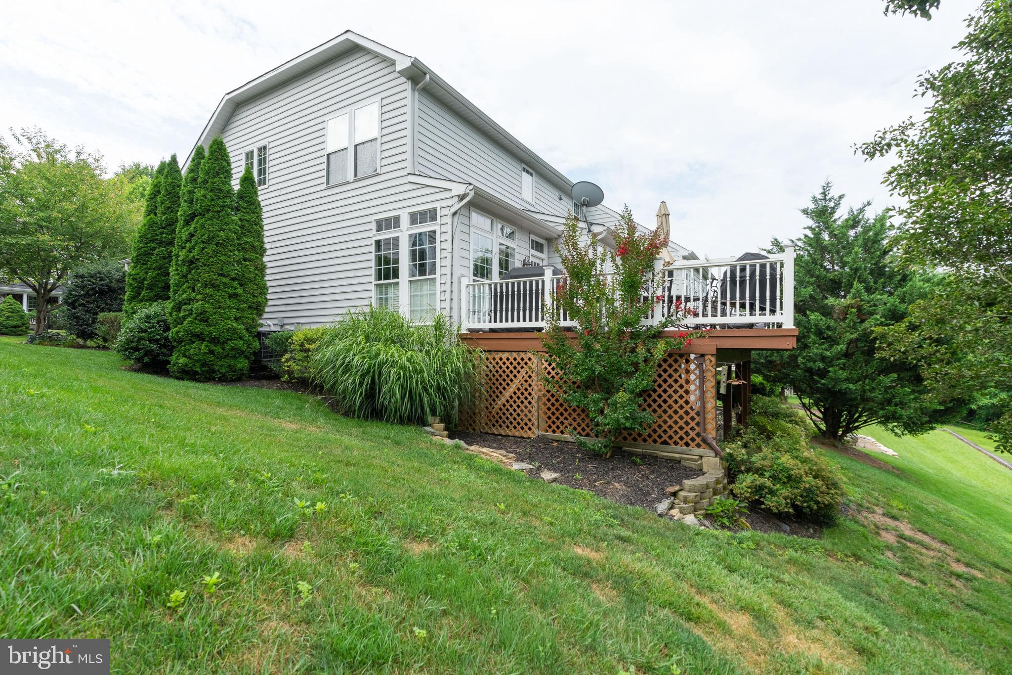 11030 Country Club Road New Market, MD 21774 - Photo 58 of 63 Side view of home and large deck.