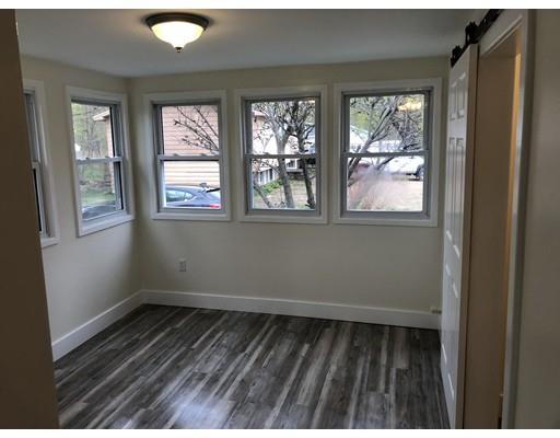 14 Off Bourne Street Three Rivers, MA 01080 - Photo 29 of 29 en empty room with wooden floor and windows