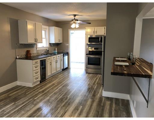 14 Off Bourne Street Three Rivers, MA 01080 - Photo 10 of 29 a kitchen with stainless steel appliances granite countertop a stove and a refrigerator