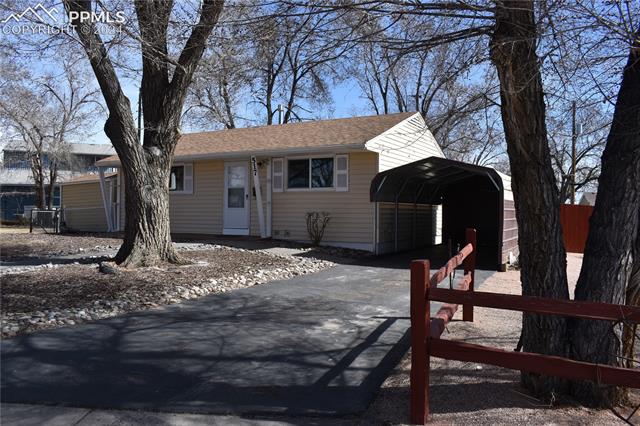 517 Erie Road Colorado Springs, CO 80910 - Photo 2 of 14 View of front of house featuring a carport