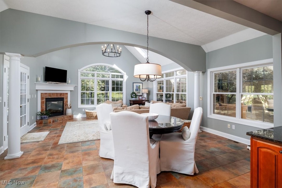 4679 Paxton Road Akron, OH 44321 - Photo 24 of 46 The kitchen has a charming dinette area that opens to the large vaulted ceiling hearth room. Such relaxing space for morning coffee!