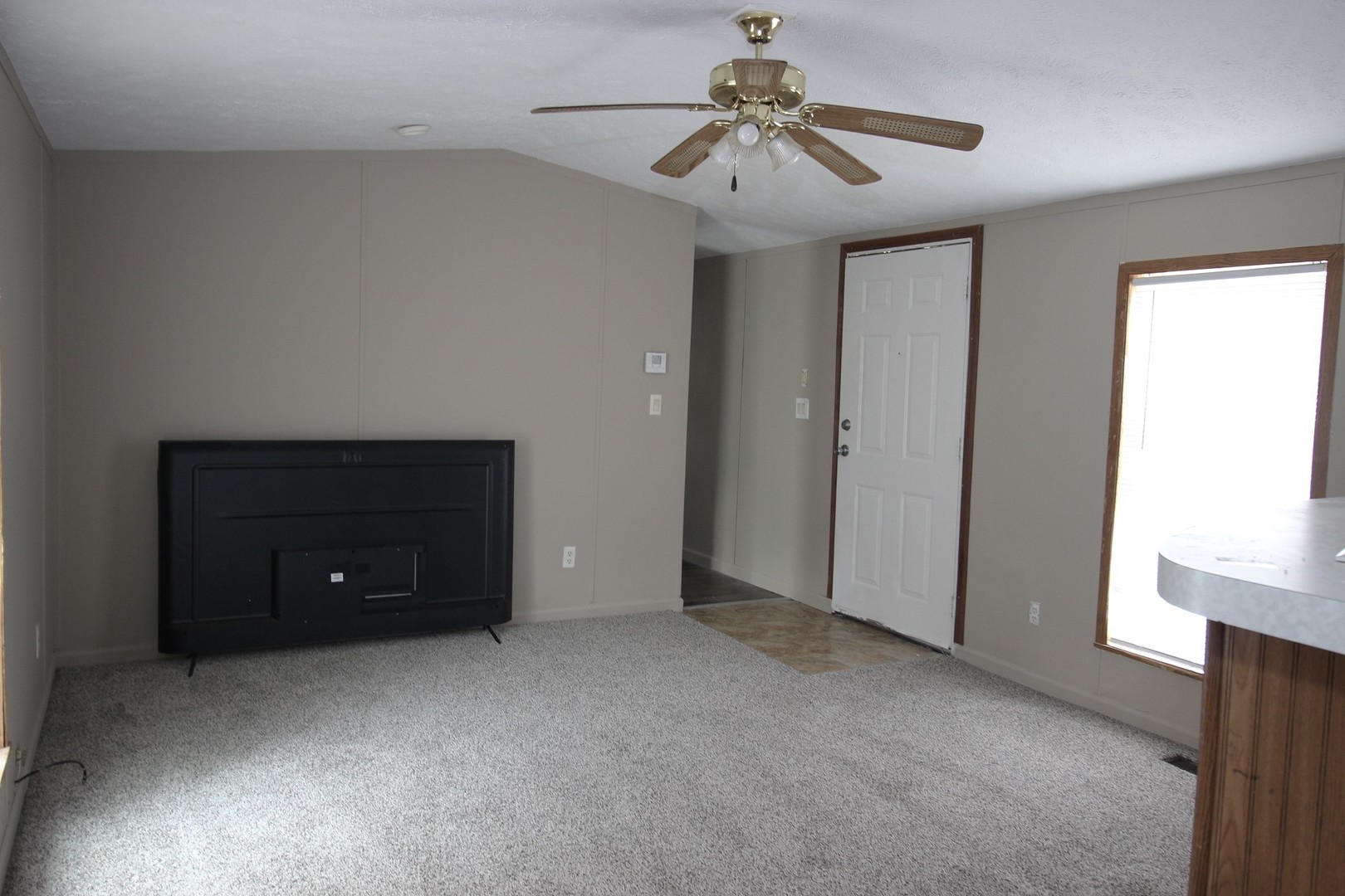 1804 C Street Normal, IL 61761 - Photo 5 of 14 a view of an empty room with a window