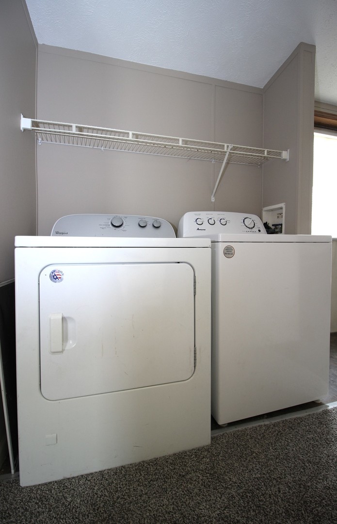 1804 C Street Normal, IL 61761 - Photo 8 of 14 a utility room with dryer and washer