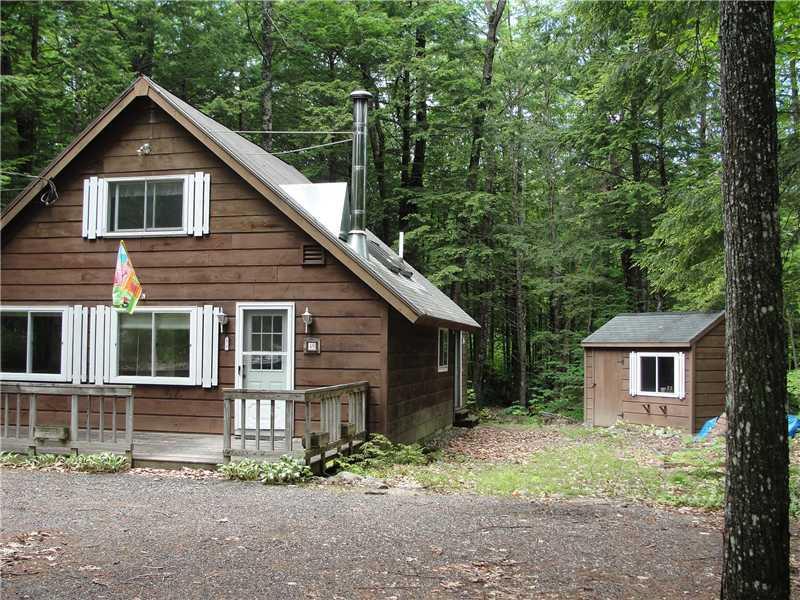 48 North Bay Road Bridgton, ME 04009 - Photo 2 of 26 Exterior Front. Newer shed out back...