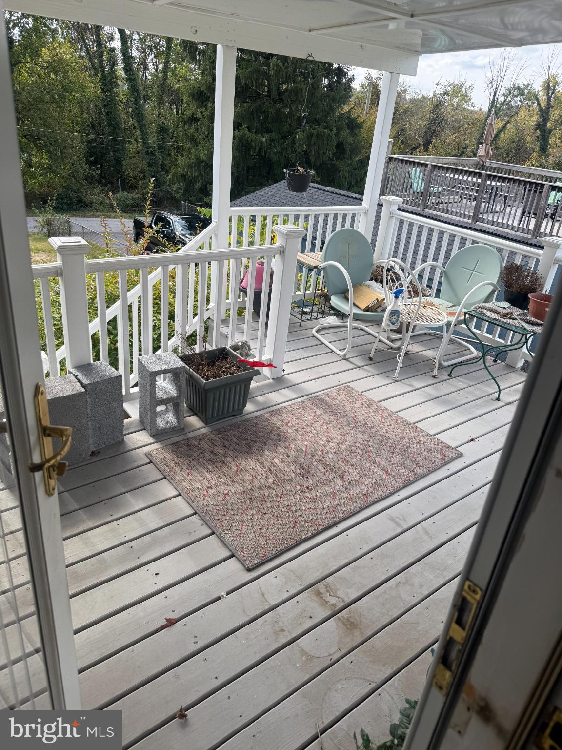 111 Ridge Avenue Baltimore, MD 21227 - Photo 5 of 10 Charming deck with serene outdoor vibes.