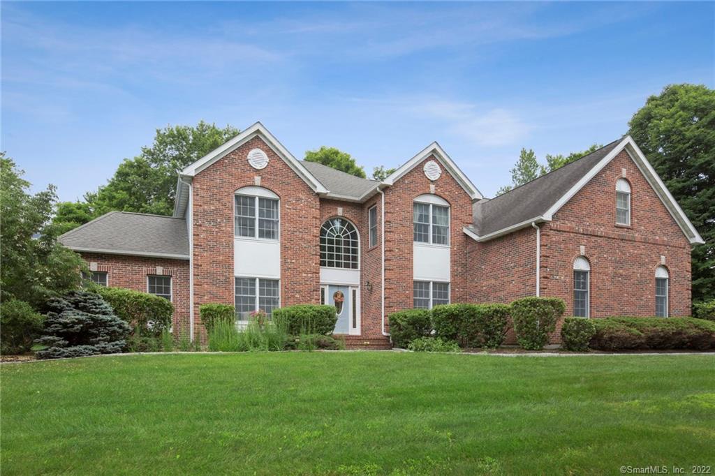 10 Whitewood Road Newtown, CT 06470 - Photo 1 of 1 Beautiful Brick façade, multiple roof lines.