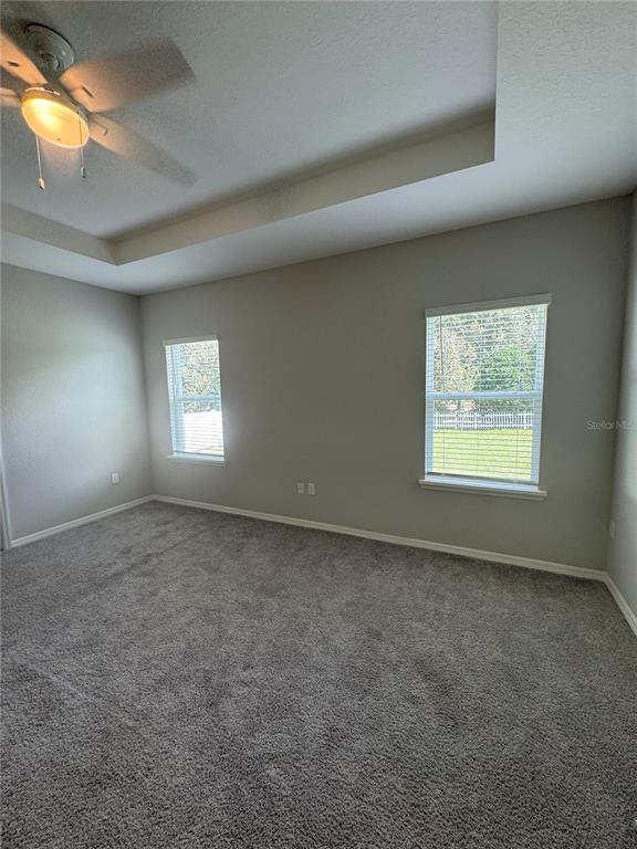 5515 Southeast 91st Street Ocala, FL 34480 - Photo 20 of 40 a view of an empty room and window