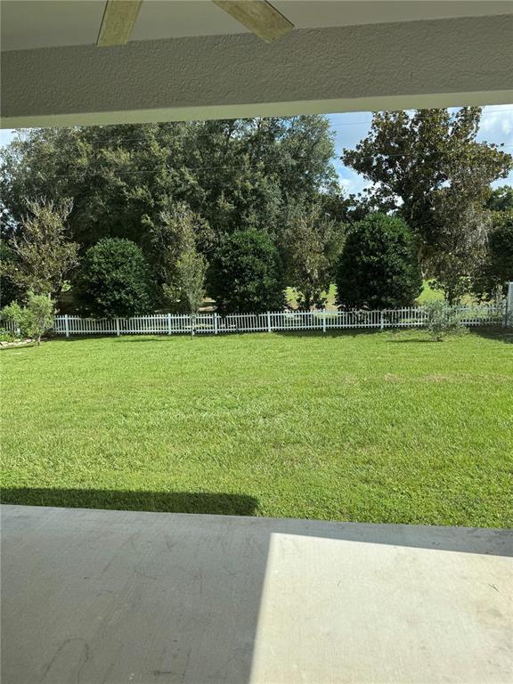 5515 Southeast 91st Street Ocala, FL 34480 - Photo 22 of 40 a view of a green yard