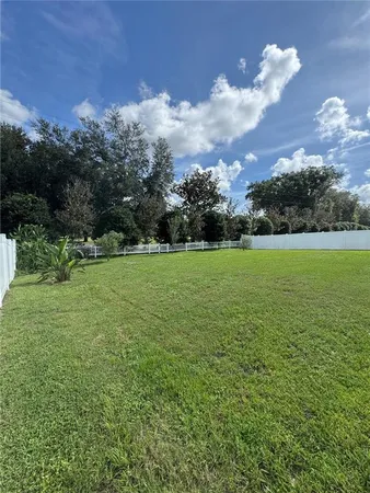 a view of a golf course with a lake