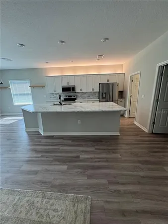 a view of kitchen and sink