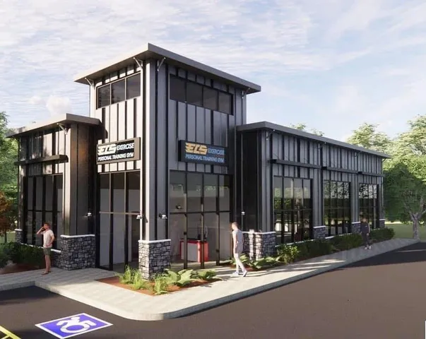 a view of a house with a iron fence