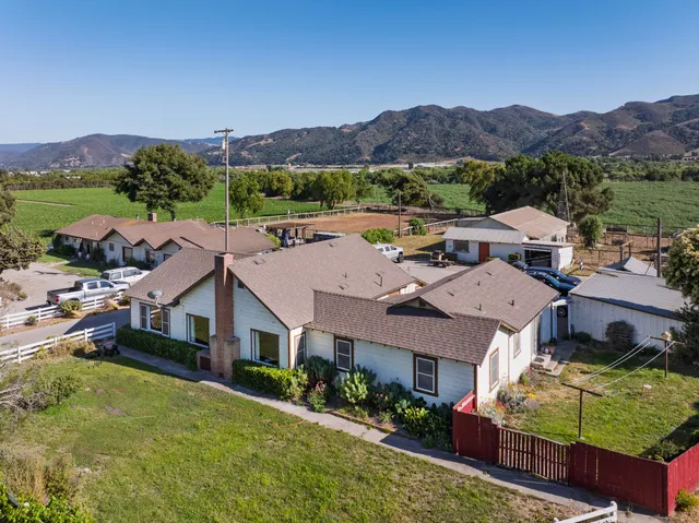 an aerial view of a golf course with outdoor space