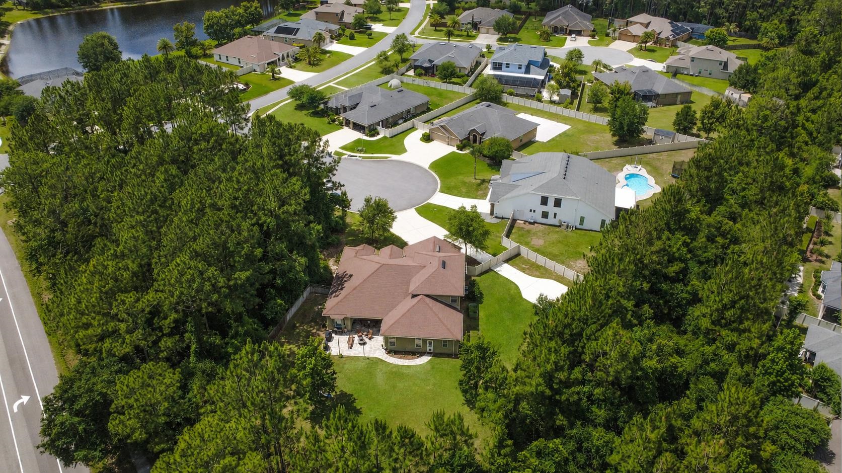 1308 Acorn Ridge Court St. Augustine, FL 32092 - Photo 44 of 47 an aerial view of residential house with outdoor space and swimming pool