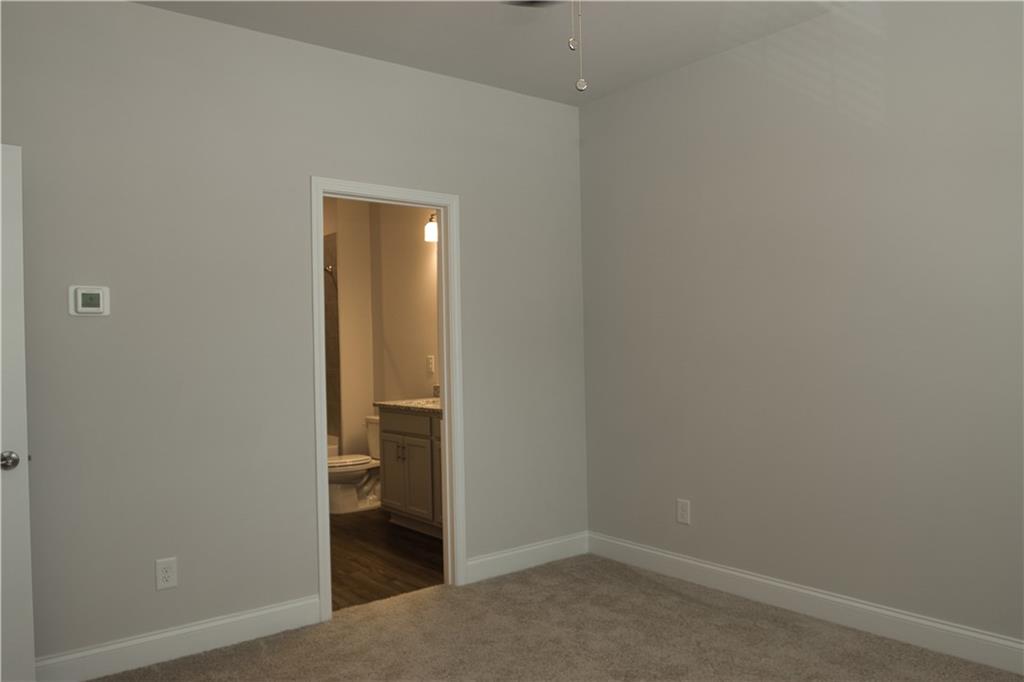 6120 Ripple Way, Unit 46 Atlanta, GA 30349 - Photo 12 of 19 a view of an empty room and closet