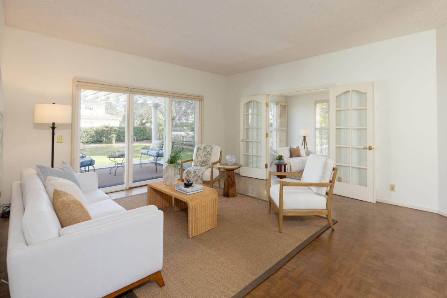21 Pinehurst Lane Half Moon Bay, CA 94019 - Photo 14 of 43 a living room with furniture and a large window