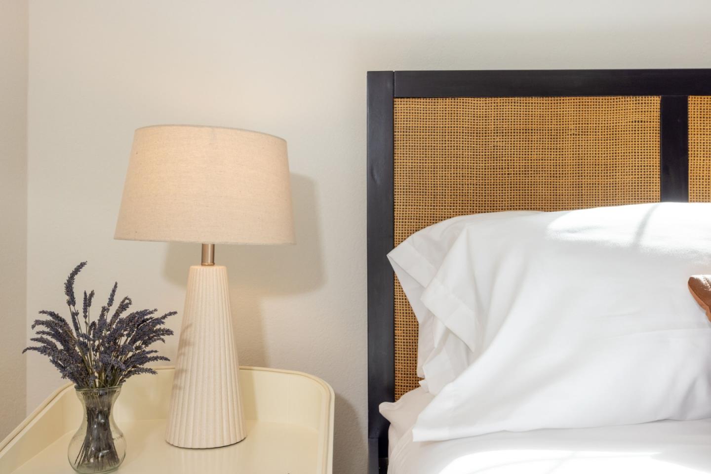 21 Pinehurst Lane Half Moon Bay, CA 94019 - Photo 21 of 43 a bed sitting in a bedroom next to a window