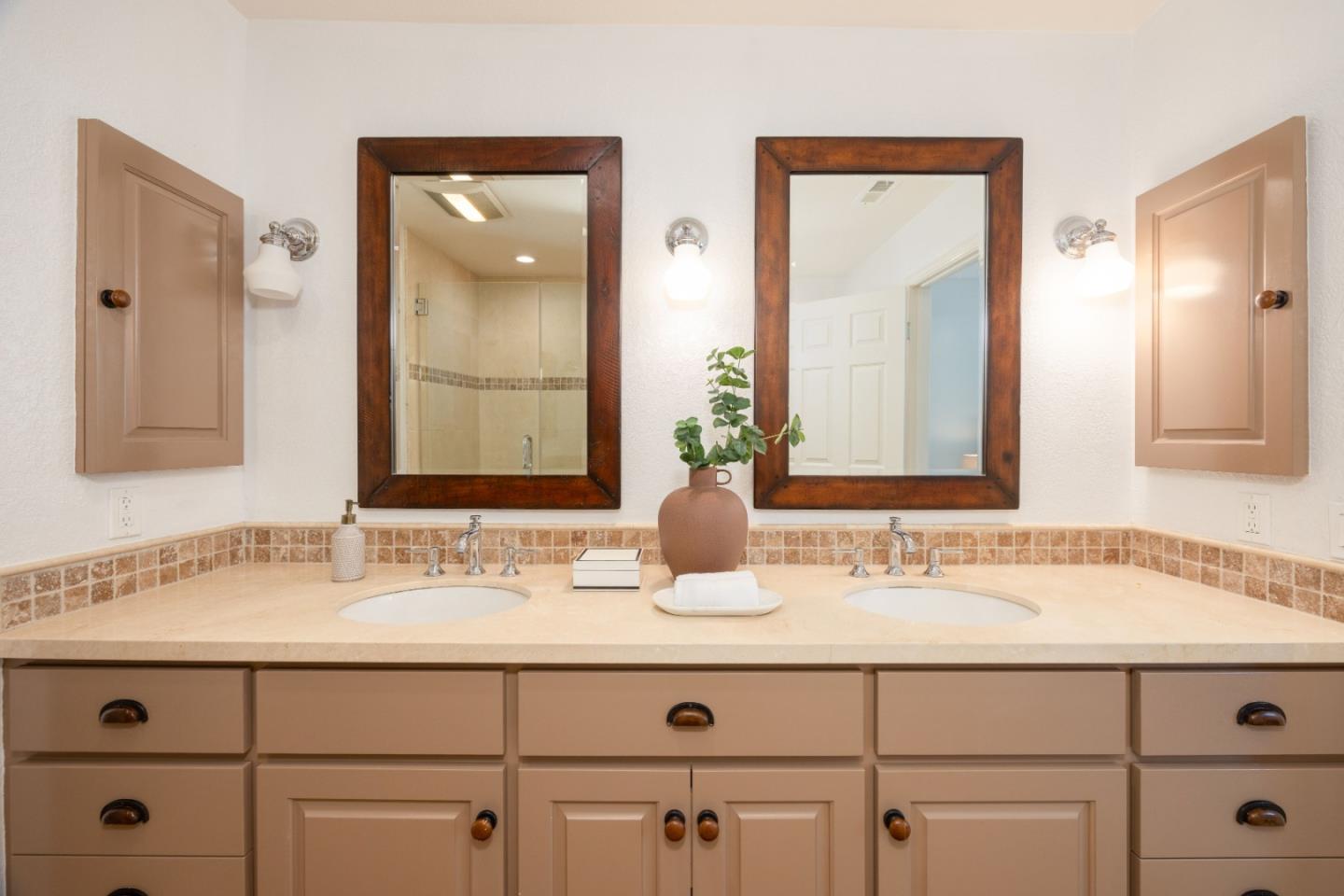 21 Pinehurst Lane Half Moon Bay, CA 94019 - Photo 25 of 43 a bathroom with a sink and a mirror