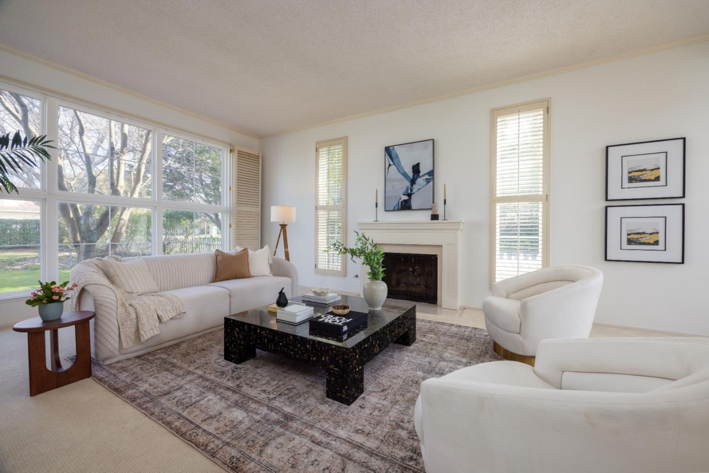 21 Pinehurst Lane Half Moon Bay, CA 94019 - Photo 6 of 43 a living room with furniture a large window and a fireplace