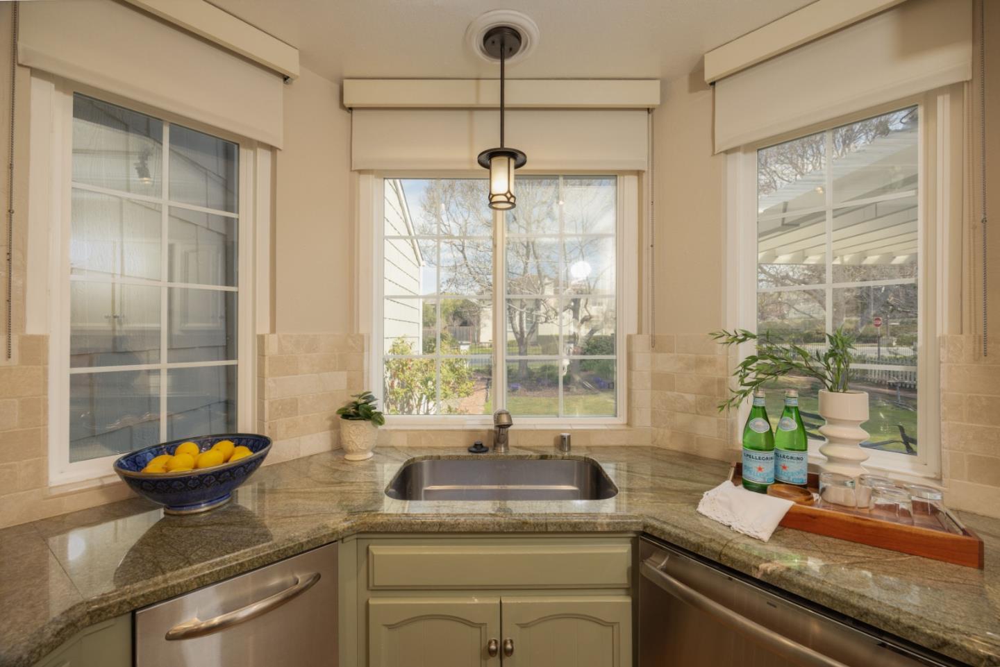 21 Pinehurst Lane Half Moon Bay, CA 94019 - Photo 10 of 43 a kitchen with a sink and a window