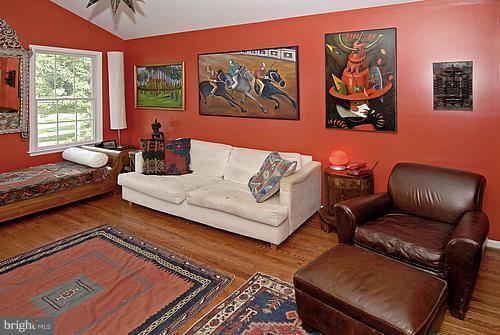 1700 Ednor Road Silver Spring, MD 20905 - Photo 1 of 18 a living room with furniture and next to a window
