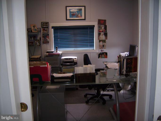 1700 Ednor Road Silver Spring, MD 20905 - Photo 2 of 18 a view of a workspace with furniture