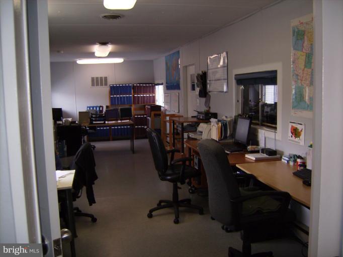 1700 Ednor Road Silver Spring, MD 20905 - Photo 11 of 18 a view of a workspace with furniture and a window