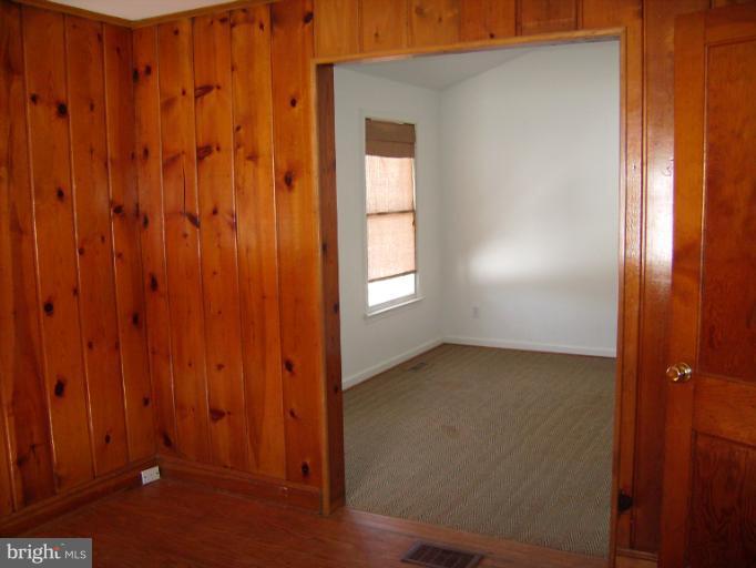 1700 Ednor Road Silver Spring, MD 20905 - Photo 8 of 18 a view of an empty room