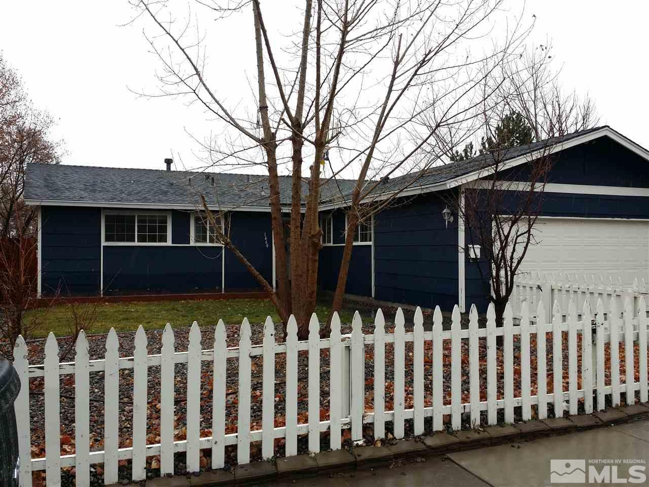 1460 Locksley Way Reno, NV 89503 - Photo 1 of 1 a front view of a house with a garden