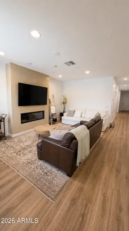 a living room with a couch and a flat screen tv